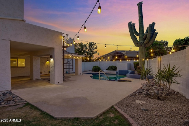 5345 E Mclellan Rd Unit 123, Mesa, AZ 85205 - patio terrace at dusk featuring a fenced backyard and a patio