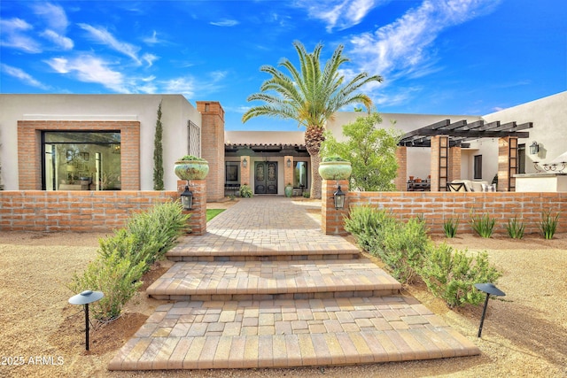 view of property's community featuring a pergola