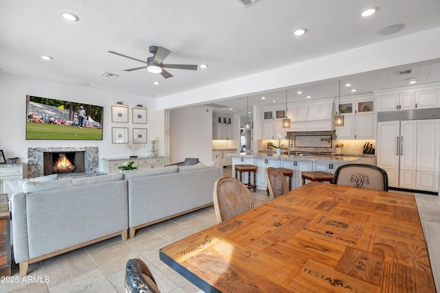 dining area featuring ceiling fan