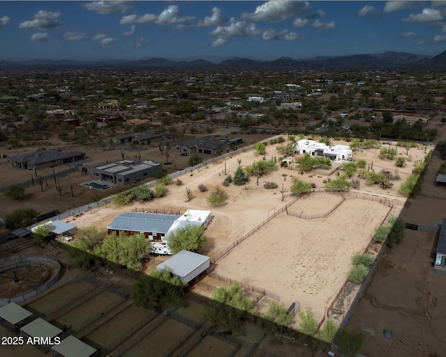 drone / aerial view featuring a mountain view