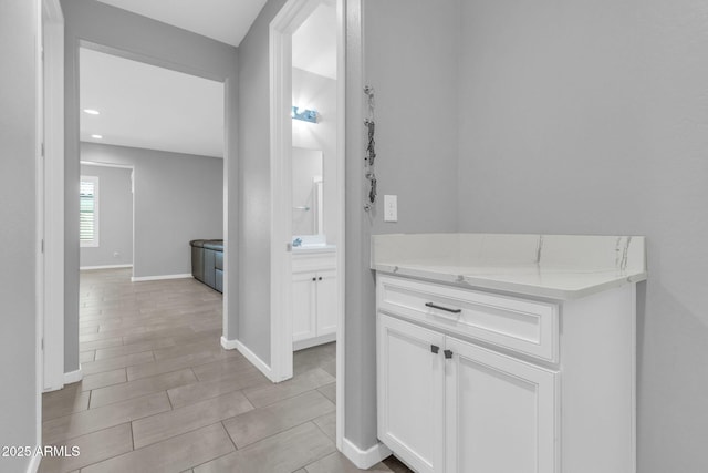 550 E Zion Pl, Chandler, AZ 85249 - corridor with baseboards and a sink