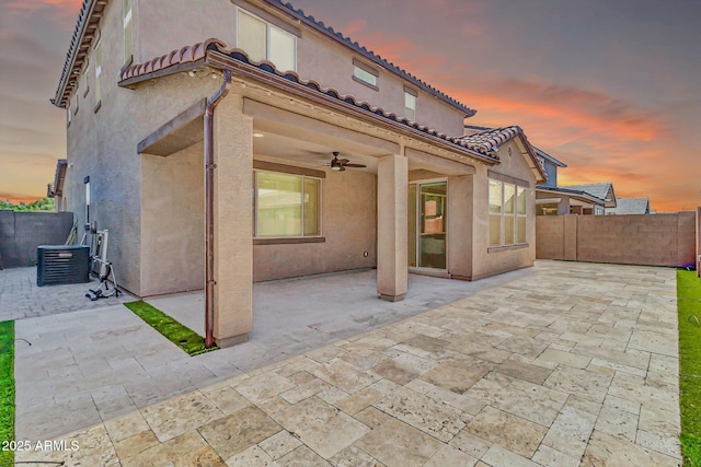550 E Zion Pl, Chandler, AZ 85249 - patio terrace at dusk with a ceiling fan and a patio area