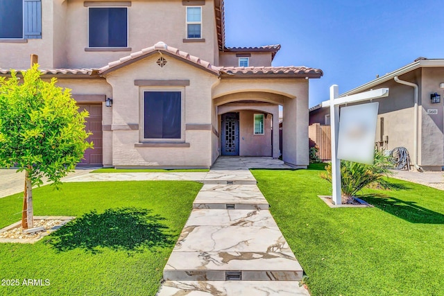550 E Zion Pl, Chandler, AZ 85249 - mediterranean / spanish home with a tiled roof, stucco siding, and a front lawn