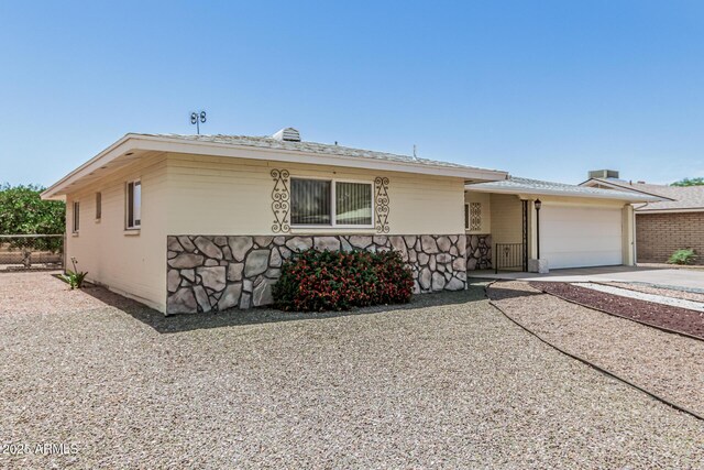 6051 E Ensenada St, Mesa, AZ 85205 - view of front of house featuring driveway and a garage