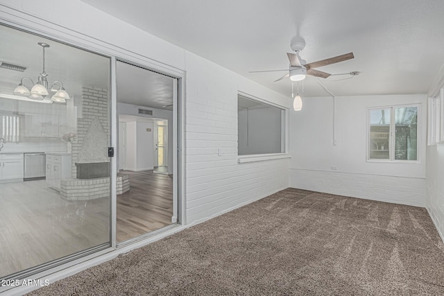 6051 E Ensenada St, Mesa, AZ 85205 - unfurnished sunroom featuring a chandelier