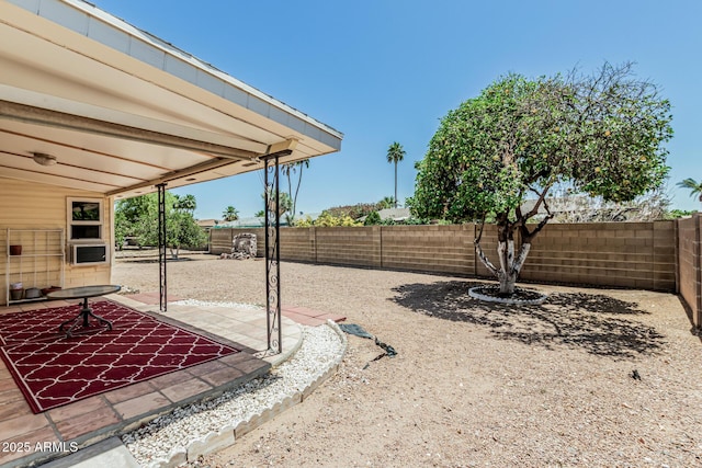 6051 E Ensenada St, Mesa, AZ 85205 - fenced backyard with a patio area