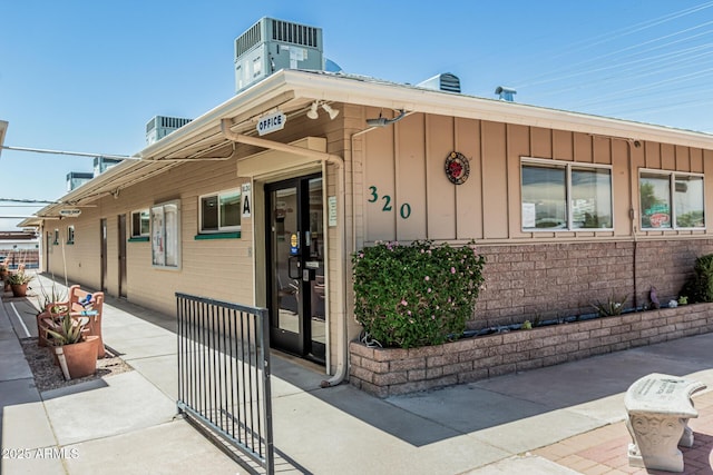 6051 E Ensenada St, Mesa, AZ 85205 - entrance to property featuring board and batten siding