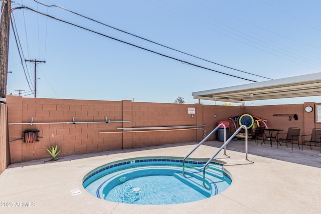 6051 E Ensenada St, Mesa, AZ 85205 - view of swimming pool with a hot tub and a patio area