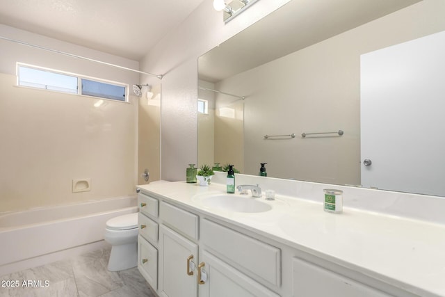 full bathroom featuring shower / washtub combination, vanity, and toilet