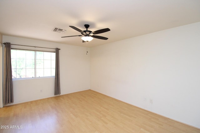 17606 N 17th Pl Unit 1096, Phoenix, AZ 85022 - spare room with light wood-style flooring and ceiling fan