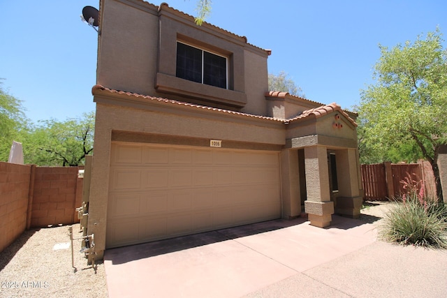 17606 N 17th Pl Unit 1096, Phoenix, AZ 85022 - mediterranean / spanish home with stucco siding, a tiled roof, an attached garage, and concrete driveway
