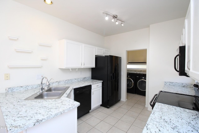 17606 N 17th Pl Unit 1096, Phoenix, AZ 85022 - kitchen featuring black appliances, separate washer and dryer, white cabinetry, light tile patterned floors, and a peninsula