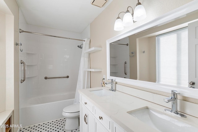 bathroom featuring vanity, tile patterned floors, and toilet