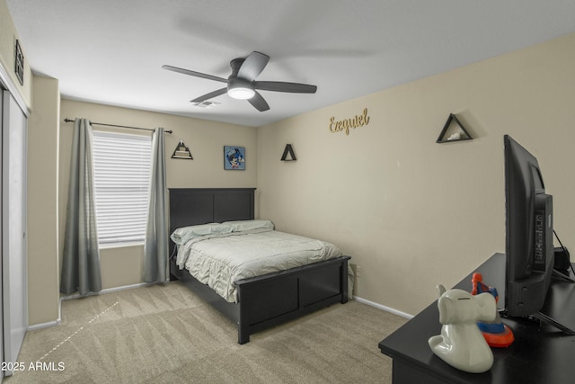 bedroom featuring visible vents, light carpet, baseboards, and ceiling fan