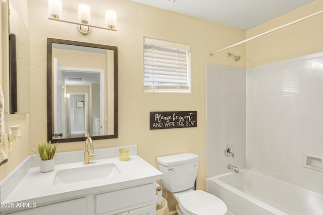 bathroom with vanity, toilet, and tub / shower combination