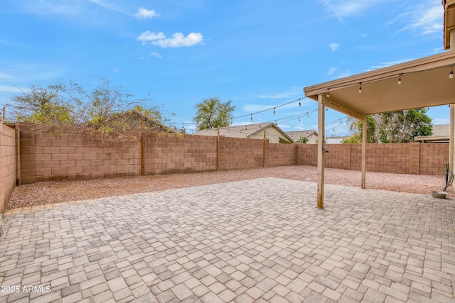 view of patio featuring a fenced backyard