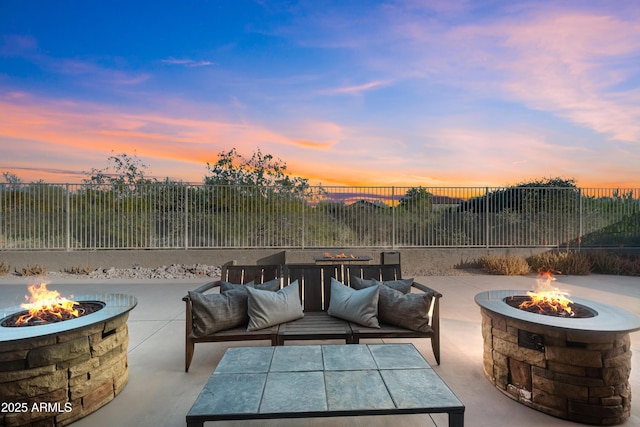 7145 E Cuernavaco Way, Gold Canyon, AZ 85118 - view of patio featuring an outdoor fire pit and fence