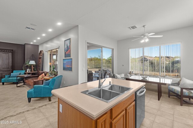 7145 E Cuernavaco Way, Gold Canyon, AZ 85118 - kitchen featuring light tile patterned floors, visible vents, dishwasher, a sink, and open floor plan
