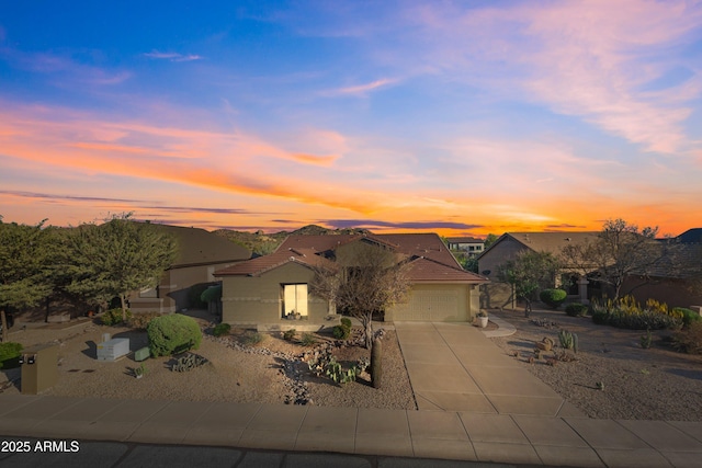 7145 E Cuernavaco Way, Gold Canyon, AZ 85118 - view of front of property with concrete driveway, stucco siding, an attached garage, and a tile roof