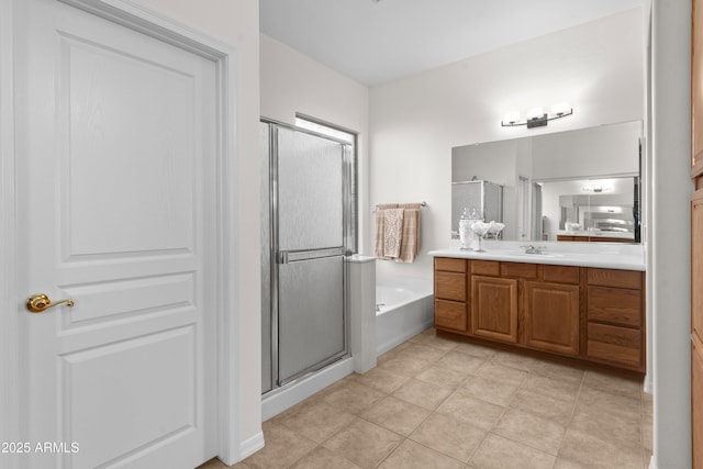 7145 E Cuernavaco Way, Gold Canyon, AZ 85118 - full bathroom featuring tile patterned flooring, a shower stall, vanity, and a garden tub