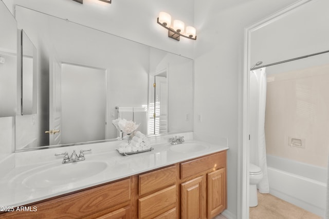 7145 E Cuernavaco Way, Gold Canyon, AZ 85118 - bathroom with toilet, tile patterned floors, double vanity, and a sink