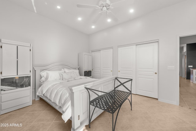 7145 E Cuernavaco Way, Gold Canyon, AZ 85118 - bedroom featuring baseboards, recessed lighting, light tile patterned floors, a ceiling fan, and multiple closets