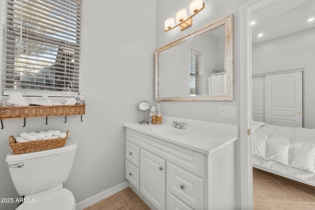 7145 E Cuernavaco Way, Gold Canyon, AZ 85118 - bathroom featuring tile patterned floors, vanity, baseboards, and toilet