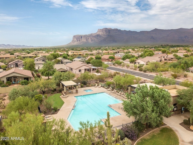 7145 E Cuernavaco Way, Gold Canyon, AZ 85118 - pool featuring a patio area, fence, a gazebo, a mountain view, and a residential view