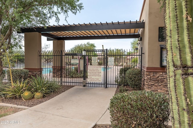 7145 E Cuernavaco Way, Gold Canyon, AZ 85118 - view of gate with a pergola and fence
