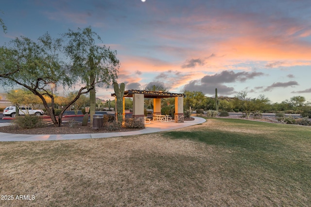7145 E Cuernavaco Way, Gold Canyon, AZ 85118 - surrounding community with a pergola and a lawn
