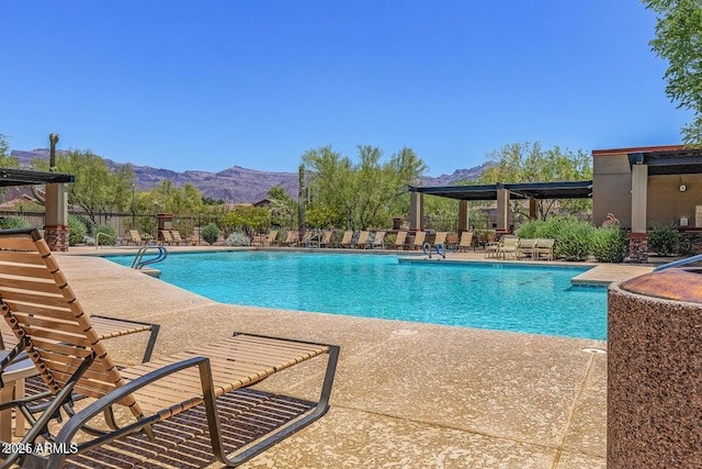 7145 E Cuernavaco Way, Gold Canyon, AZ 85118 - community pool with a patio area and a mountain view