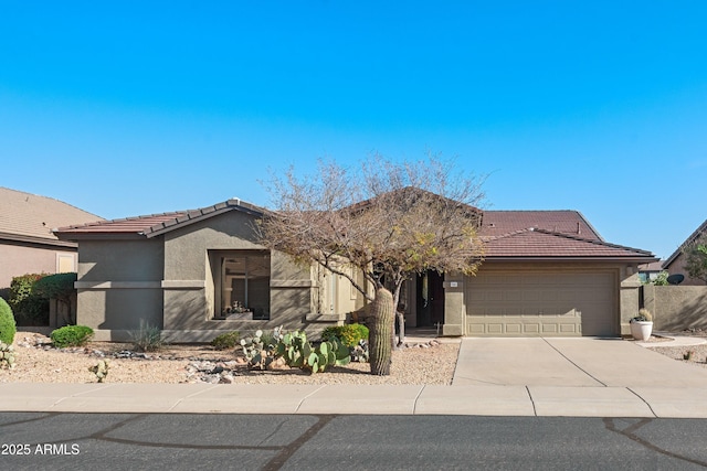 7145 E Cuernavaco Way, Gold Canyon, AZ 85118 - view of front of property featuring a tiled roof, driveway, a garage, and stucco siding