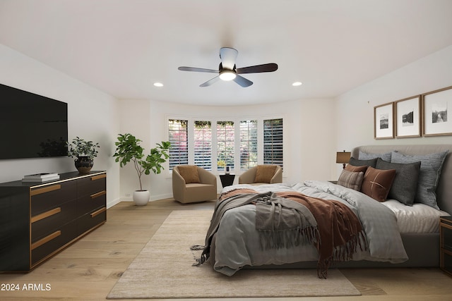 bedroom featuring ceiling fan and light wood-type flooring