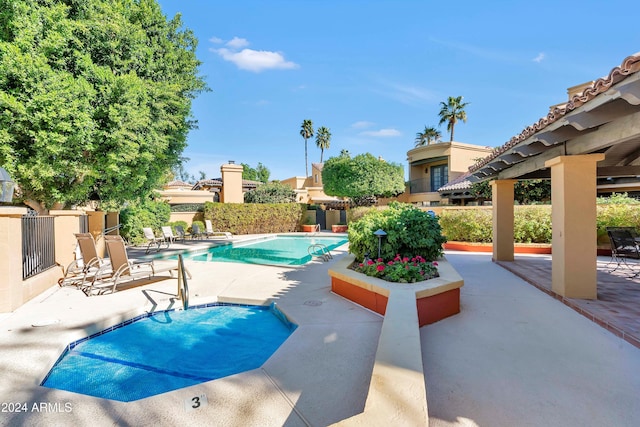 view of pool with a patio area