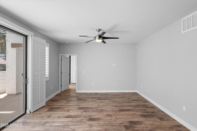 2511 W Queen Creek Rd Unit 116, Chandler, AZ 85248 - spare room with ceiling fan, wood finished floors, and baseboards