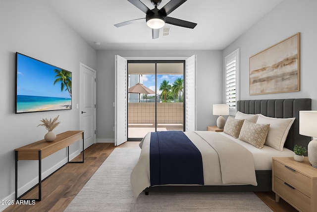 2511 W Queen Creek Rd Unit 116, Chandler, AZ 85248 - bedroom featuring access to exterior, wood finished floors, baseboards, and a ceiling fan