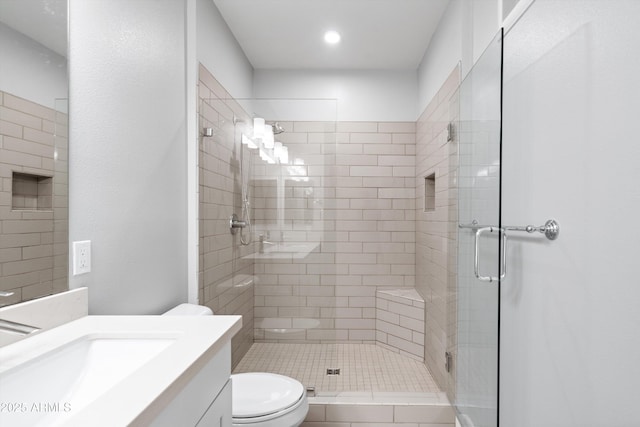 2511 W Queen Creek Rd Unit 116, Chandler, AZ 85248 - full bathroom featuring vanity, toilet, a stall shower, and recessed lighting