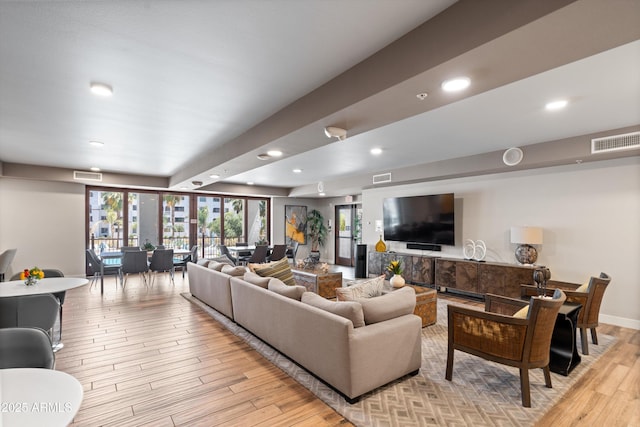 2511 W Queen Creek Rd Unit 116, Chandler, AZ 85248 - living room with light wood-style floors and recessed lighting