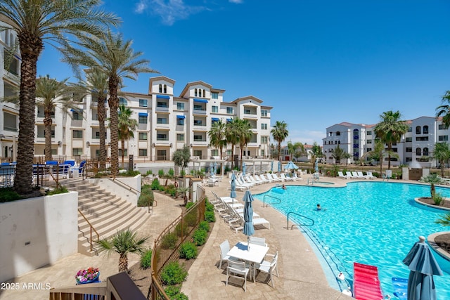 2511 W Queen Creek Rd Unit 116, Chandler, AZ 85248 - community pool featuring a patio