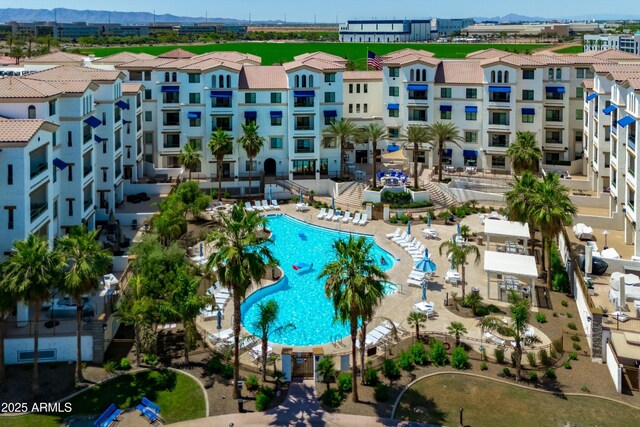 2511 W Queen Creek Rd Unit 116, Chandler, AZ 85248 - drone / aerial view of a pool area and mountains