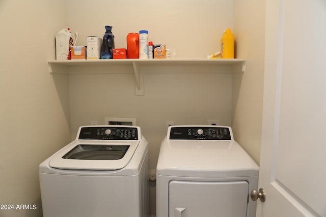 laundry area featuring washer and clothes dryer