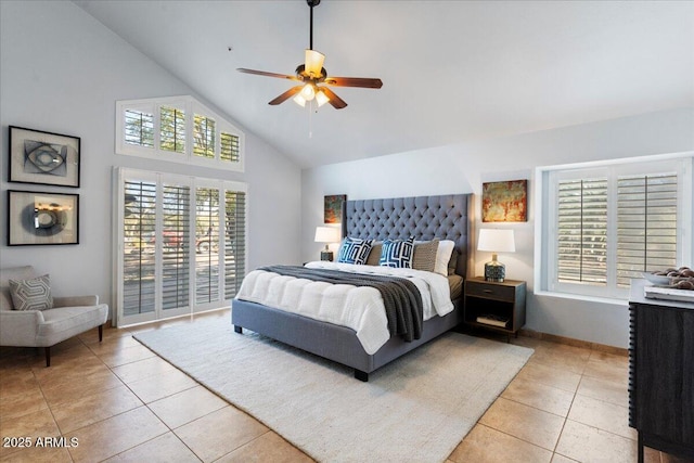 bedroom with light tile patterned floors, high vaulted ceiling, multiple windows, and baseboards