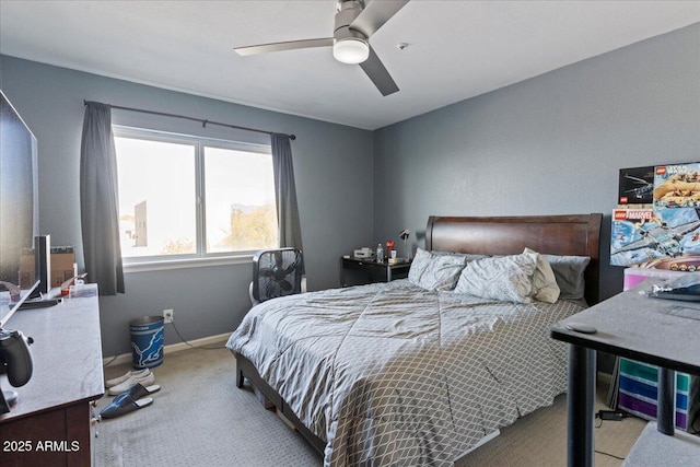 bedroom with light carpet, ceiling fan, and baseboards