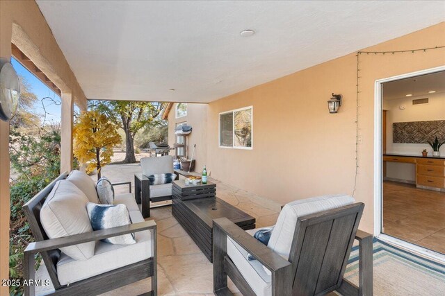 view of patio with an outdoor living space