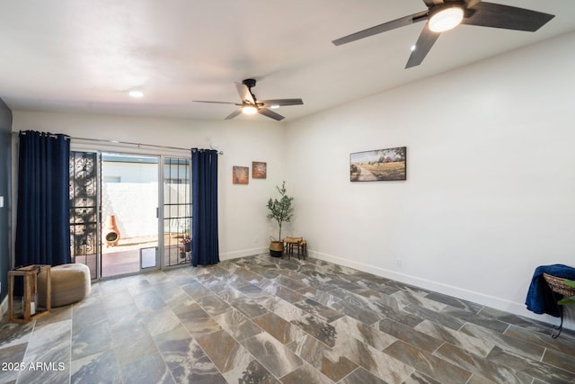 empty room featuring ceiling fan