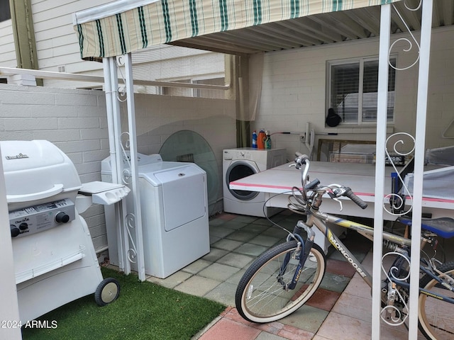 laundry room with washer and clothes dryer