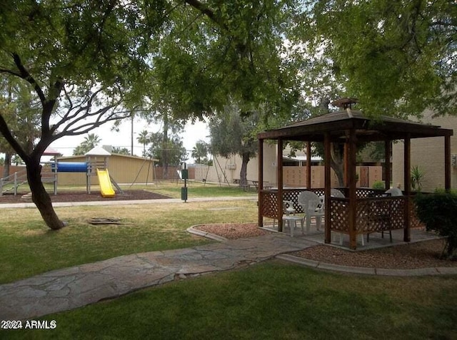 view of yard featuring a playground and a gazebo