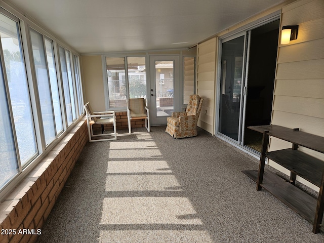 unfurnished sunroom with plenty of natural light