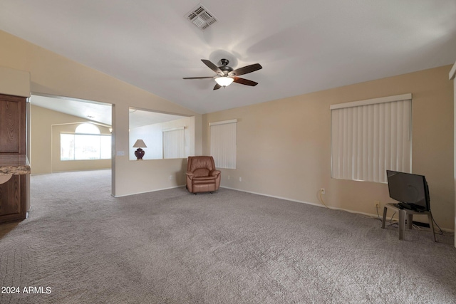 interior space with ceiling fan and lofted ceiling