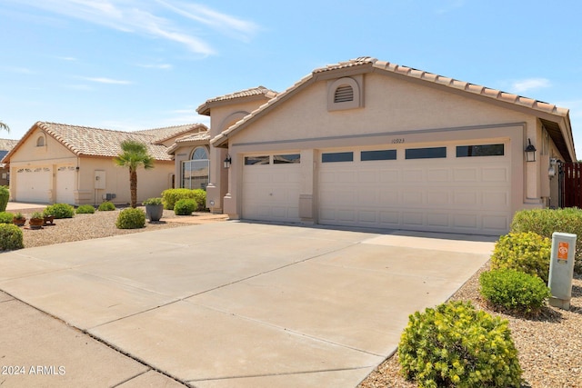 view of front of property featuring a garage